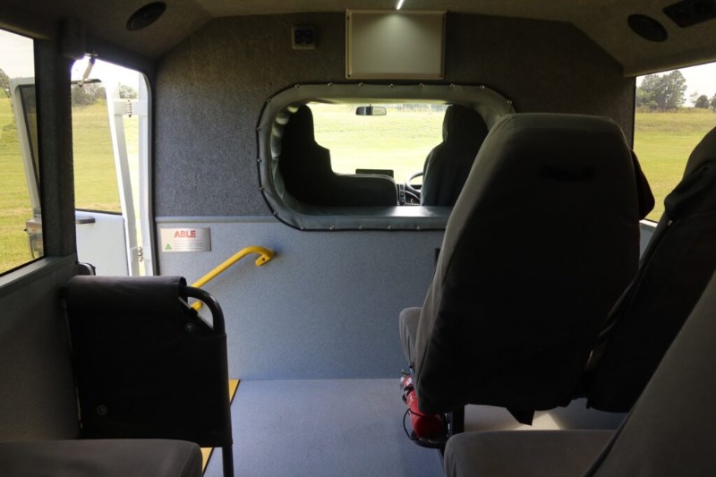 
								Isuzu NLS 45-150 AWD – COACH full									