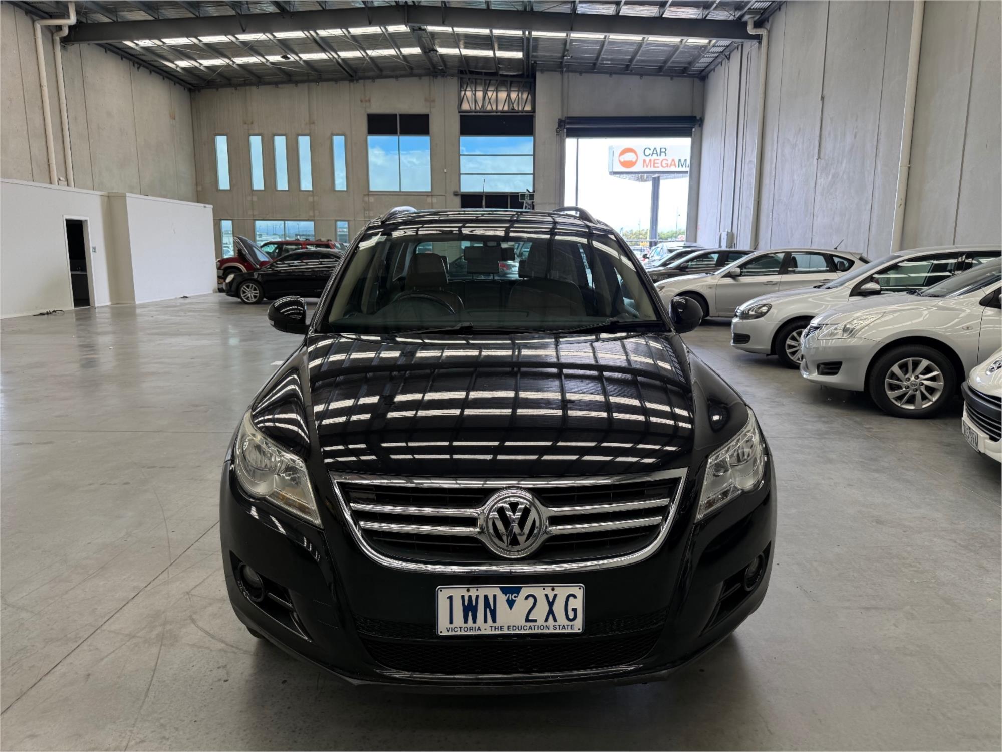 
								2010 VOLKSWAGEN TIGUAN 125 TSI full									