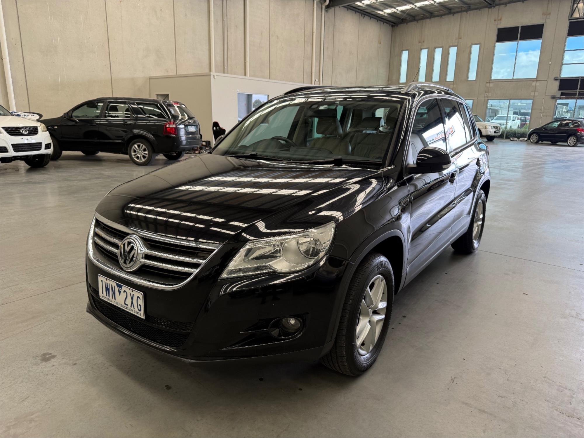 
								2010 VOLKSWAGEN TIGUAN 125 TSI full									