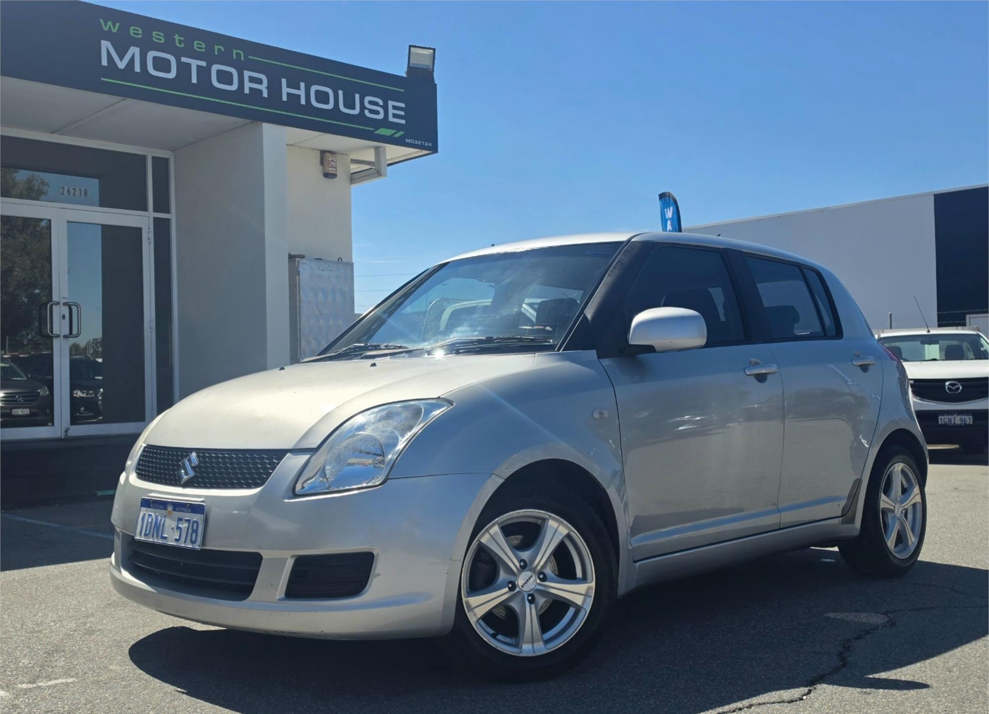 
								2010 Suzuki Swift full									