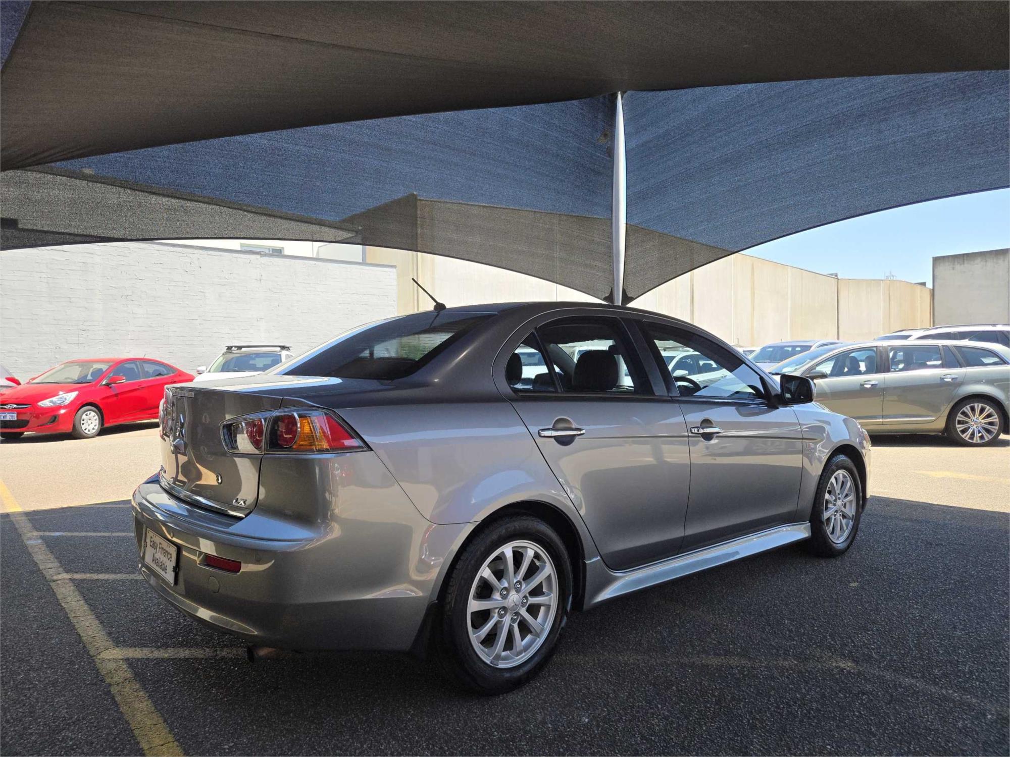 
								2012 Mitsubishi Lancer LX full									