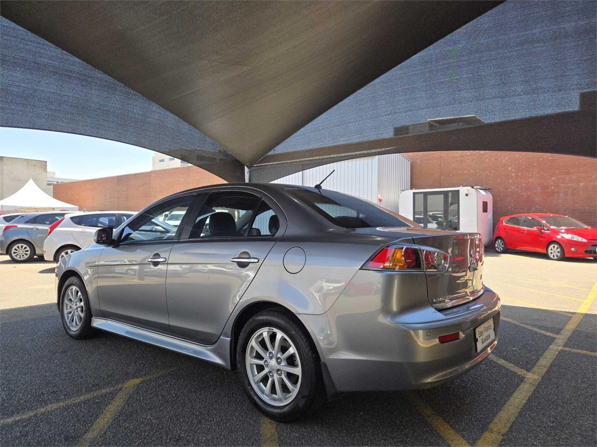 
								2012 Mitsubishi Lancer LX full									