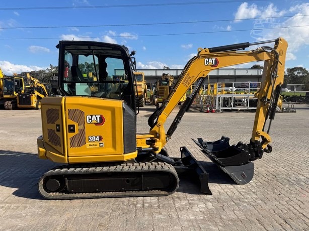 
								2023 CATERPILLAR 304 full									