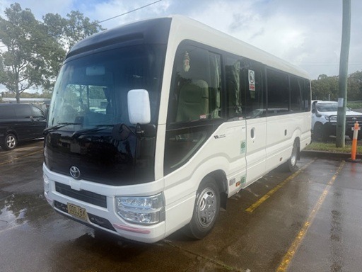 2022 Toyota Coaster Deluxe automatic 21 passenger lap sash seat belted mini bus