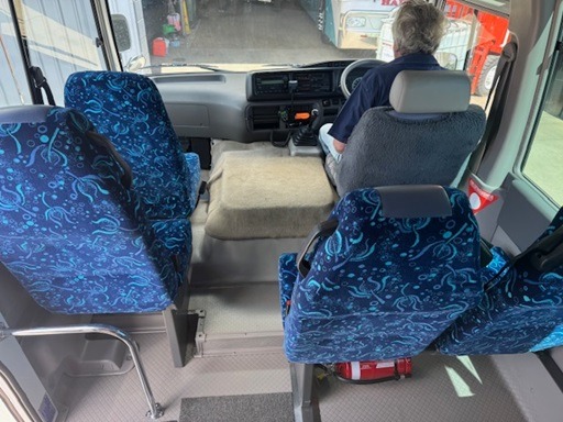 
								2009 Toyota Coaster Deluxe manual 19 passenger wheelchair lift equipped bus full									