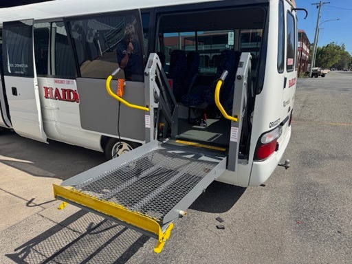 
								2009 Toyota Coaster Deluxe manual 19 passenger wheelchair lift equipped bus full									