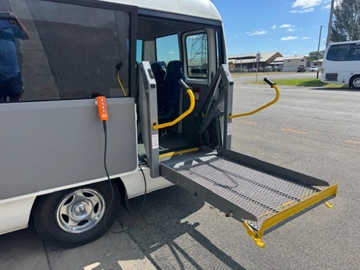 
								2009 Toyota Coaster Deluxe manual 19 passenger wheelchair lift equipped bus full									