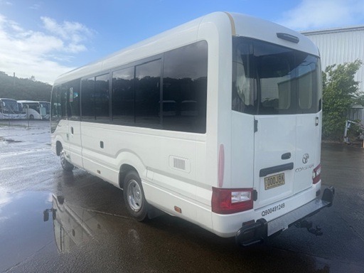 
								2022 Toyota Coaster Deluxe automatic 21 passenger lap sash seat belted mini bus full									